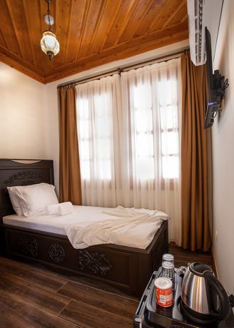Imagen de la habitación del WOO Town Suites. Foto 9