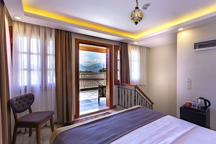 Imagen de la habitación del WOO Town Suites. Foto 12