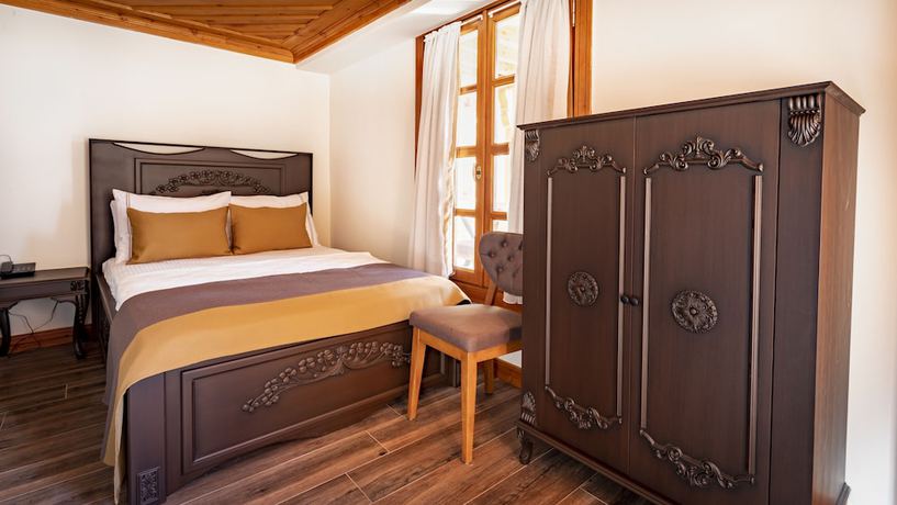 Imagen de la habitación del WOO Town Suites. Foto 13