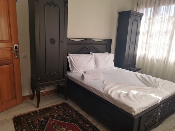 Imagen de la habitación del WOO Town Suites. Foto 14
