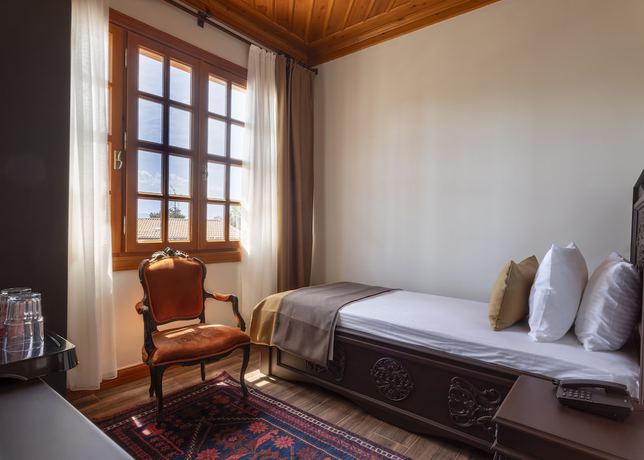Imagen de la habitación del WOO Town Suites. Foto 17
