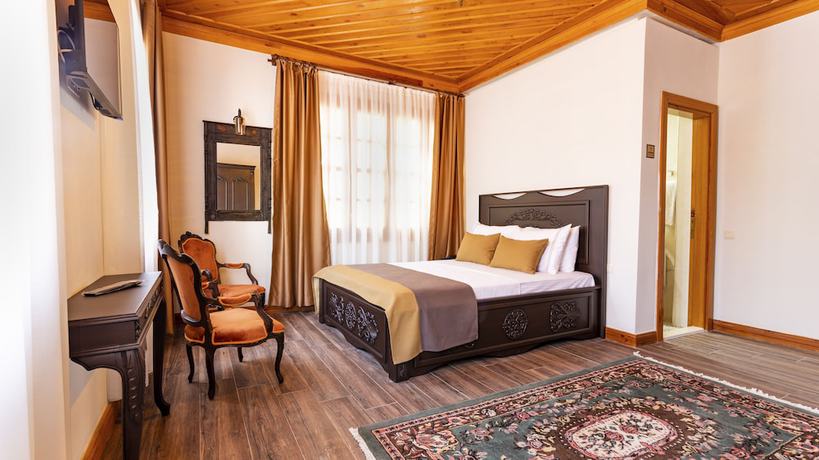 Imagen de la habitación del WOO Town Suites. Foto 18
