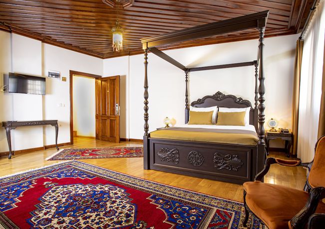 Imagen de la habitación del WOO Town Suites. Foto 20