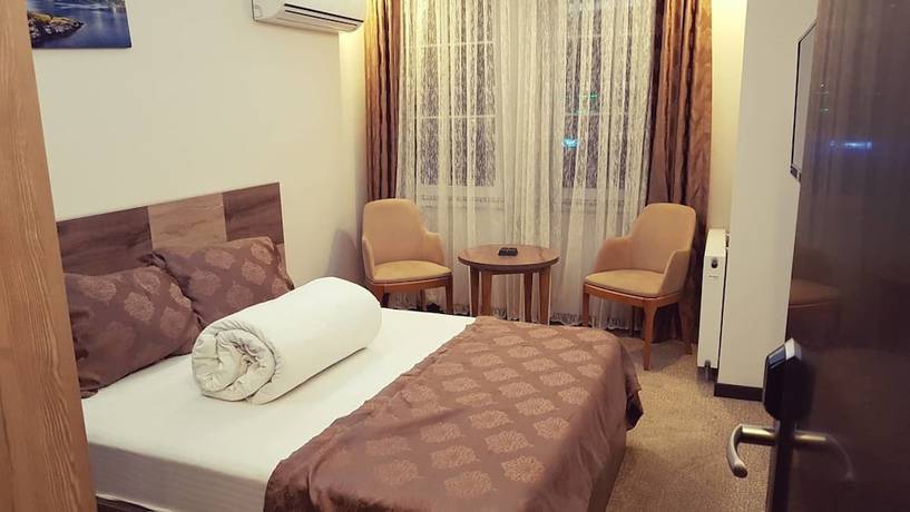 Imagen de la habitación del Waha Hotel. Foto 5