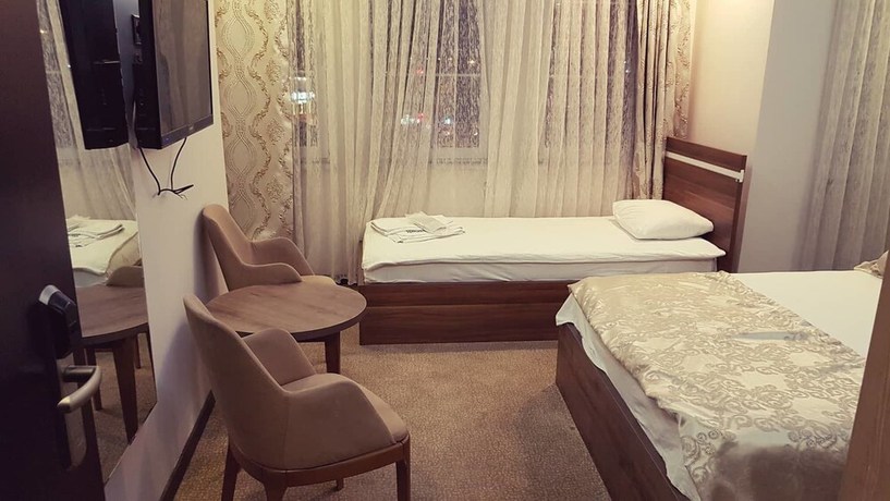 Imagen de la habitación del Waha Hotel. Foto 7