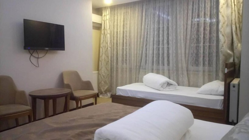 Imagen de la habitación del Waha Hotel. Foto 8