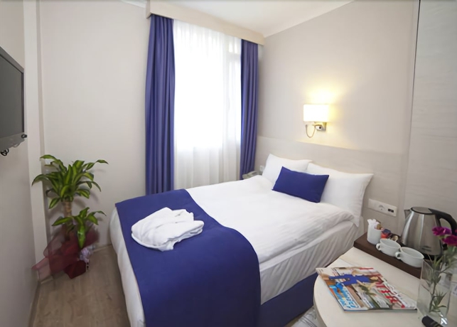 Imagen de la habitación del Walk In Hotel. Foto 11