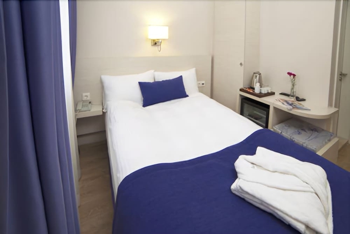 Imagen de la habitación del Walk In Hotel. Foto 17