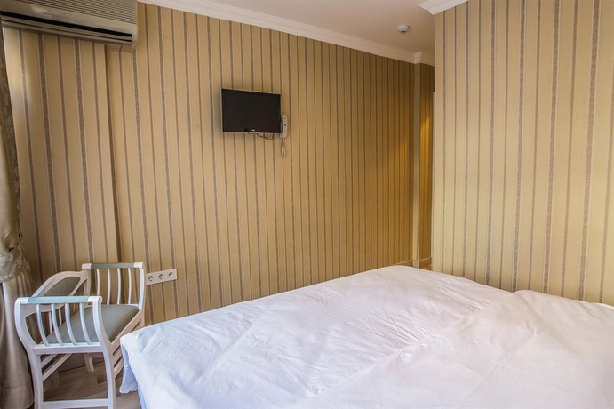 Imagen de la habitación del Walnut Shell Hotel. Foto 2