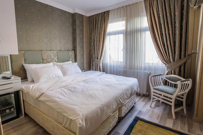 Imagen de la habitación del Walnut Shell Hotel. Foto 3