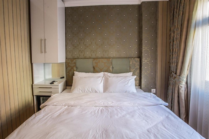 Imagen de la habitación del Walnut Shell Hotel. Foto 10