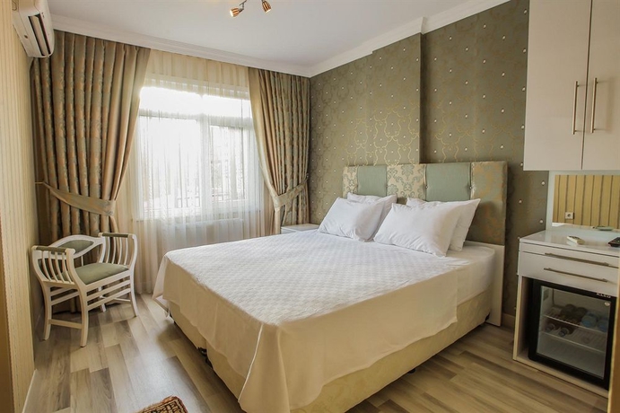 Imagen de la habitación del Walnut Shell Hotel. Foto 11