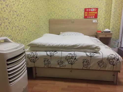 Imagen de la habitación del Wanfeng Hotel. Foto 7