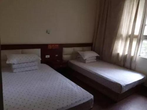 Imagen de la habitación del Wanfeng Hotel. Foto 8