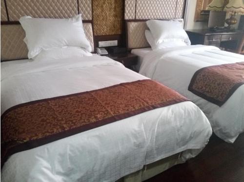 Imagen general del Wanning Qiaolong Hotel. Foto 3