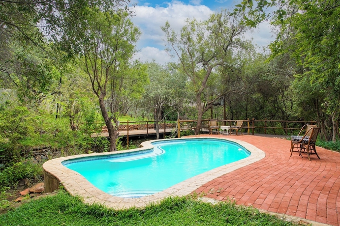 Imagen de la piscina del Warthogs Bush Lodge. Foto 16