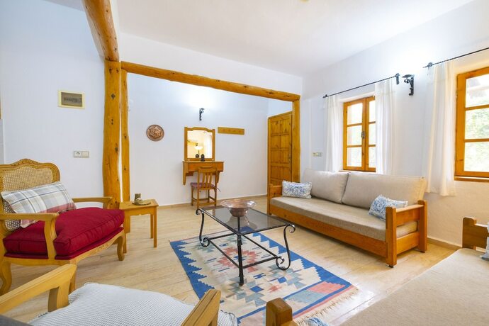 Imagen de la habitación del Watermill Villa and Hotel Faralya. Foto 14