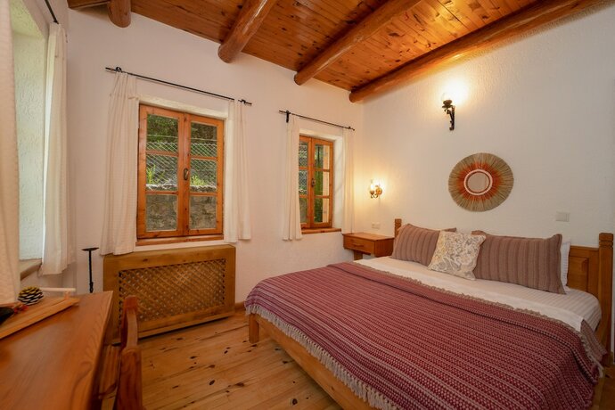 Imagen de la habitación del Watermill Villa and Hotel Faralya. Foto 15