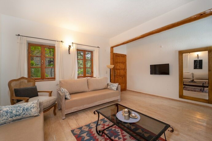 Imagen de la habitación del Watermill Villa and Hotel Faralya. Foto 18