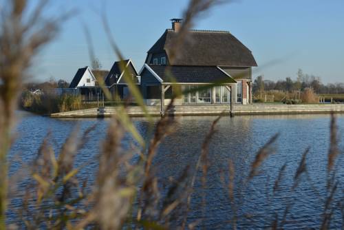 Imagen de la habitación del Waterresort Bodelaeke Giethoorn. Foto 4