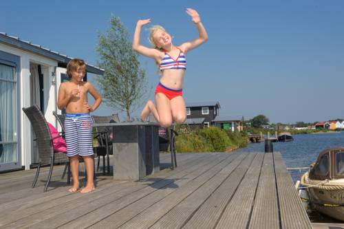 Imagen de la habitación del Waterresort Bodelaeke Giethoorn. Foto 10
