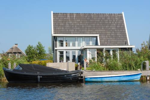 Imagen de la habitación del Waterresort Bodelaeke Giethoorn. Foto 11