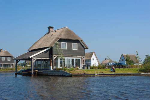 Imagen de la habitación del Waterresort Bodelaeke Giethoorn. Foto 12