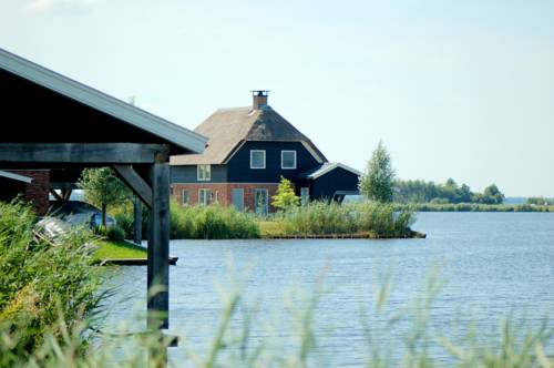 Imagen de la habitación del Waterresort Bodelaeke Giethoorn. Foto 14