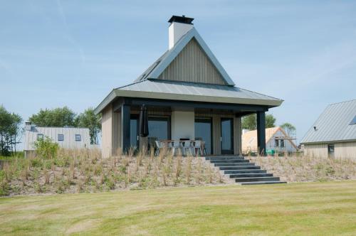 Imagen de la habitación del Waterrijk Oesterdam Resort Villas. Foto 11