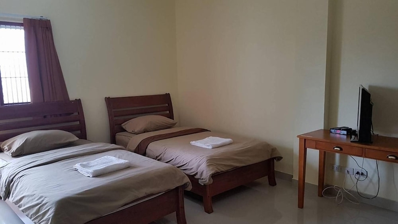 Imagen de la habitación del Wattana House. Foto 12