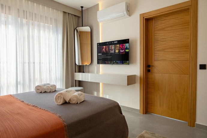 Imagen de la habitación del WeSuites. Foto 3
