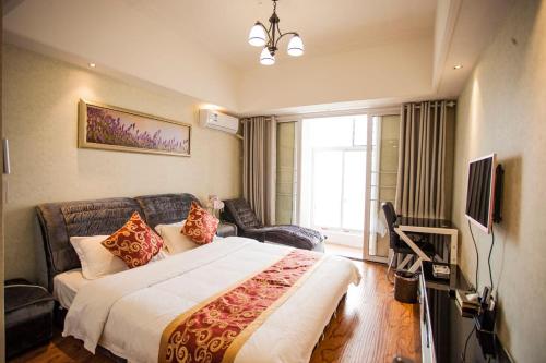 Imagen de la habitación del Wei Shi Dun Apartment. Foto 6