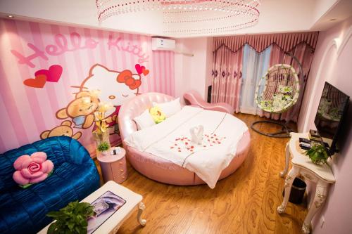 Imagen de la habitación del Wei Shi Dun Apartment. Foto 8