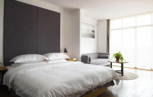 Imagen general del Weizhou Island Xinjia Yuansu Hotel. Foto 4