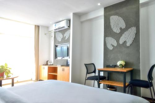 Imagen de la habitación del Weizhou Island Xinjia Yuansu Hotel. Foto 6