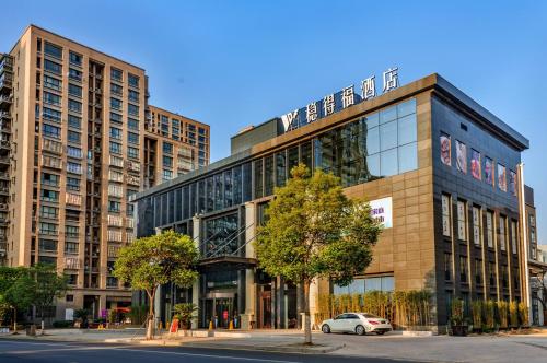 Imagen de la habitación del Wen De Fu Hotel. Foto 7