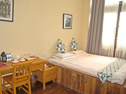 Imagen de la habitación del Wenyuan Shicheng Inn Qiandao Lake. Foto 10