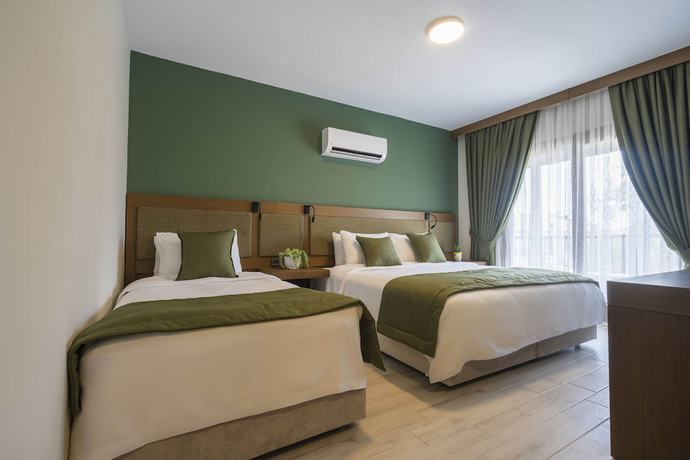Imagen de la habitación del West House Exclusive Hotel Gocek. Foto 10