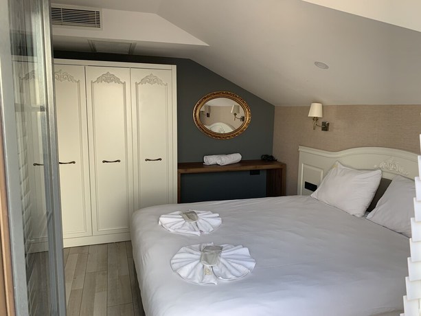 Imagen de la habitación del White Golden Suite Hotel. Foto 4