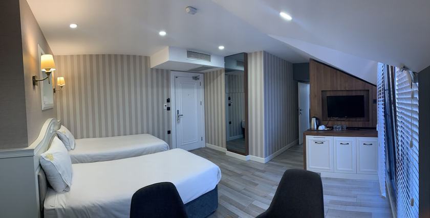 Imagen de la habitación del White Golden Suite Hotel. Foto 6