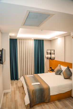 Imagen de la habitación del White Golden Suite Hotel. Foto 8