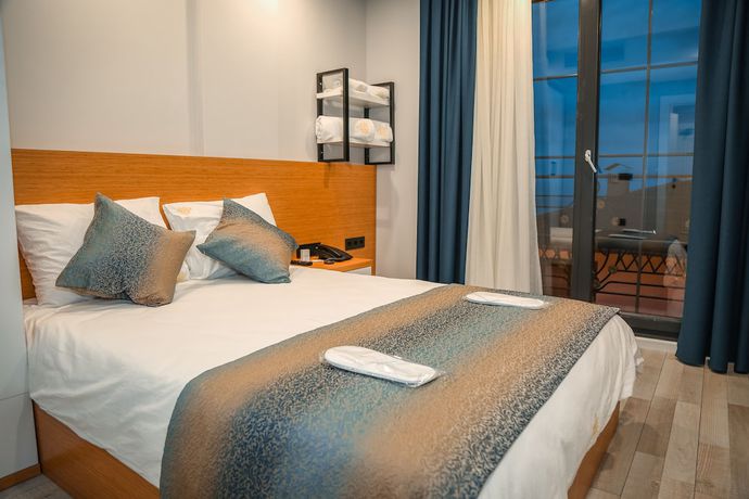 Imagen de la habitación del White Golden Suite Hotel. Foto 12