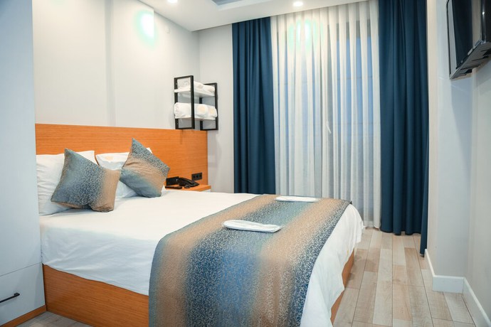 Imagen de la habitación del White Golden Suite Hotel. Foto 13