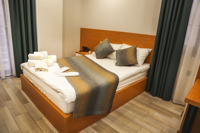 Imagen de la habitación del White Golden Suite Hotel. Foto 18