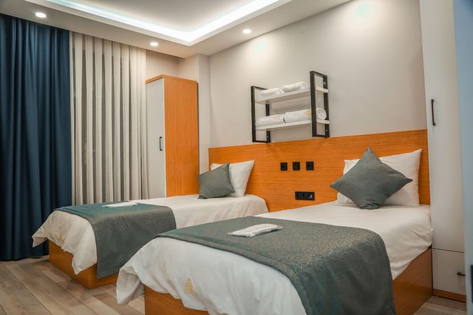 Imagen de la habitación del White Golden Suite Hotel. Foto 19