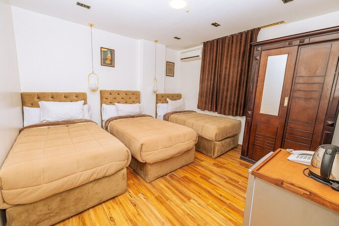 Imagen de la habitación del White Pyramids inn. Foto 17