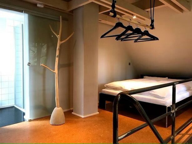 Imagen de la habitación del Wildland Natural Resort. Foto 17