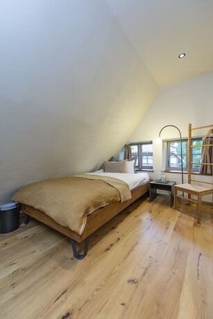 Imagen de la habitación del Wildland Natural Resort. Foto 19
