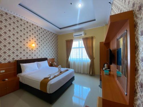 Imagen de la habitación del Wisma Jannatun Naim Lampung. Foto 9