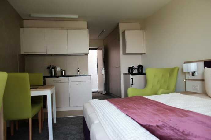 Imagen de la habitación del Wohnmotel. Foto 30